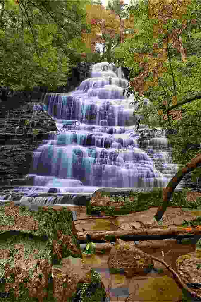 A Breathtaking Image Of A Majestic Waterfall Cascading Down A Sheer Rock Face Knowledge About Planet Earth For Kids: General Information On Lakes Seas Waterfalls Mountains: All About The Capitals Of The World