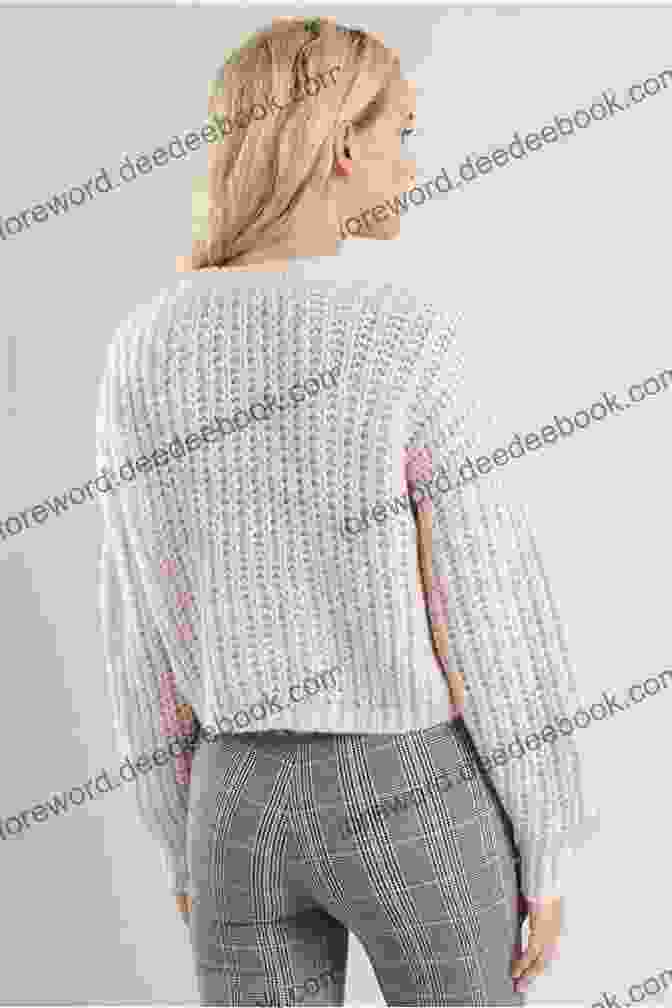 A Photo Of A Cable Stitch Sweater Just Stitches: 70 Knitting Stitch Patterns To Inspire Your Next Project (Tiger Road Crafts)