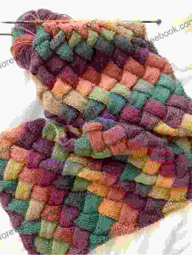 A Photo Of An Entrelac Knit Scarf Just Stitches: 70 Knitting Stitch Patterns To Inspire Your Next Project (Tiger Road Crafts)