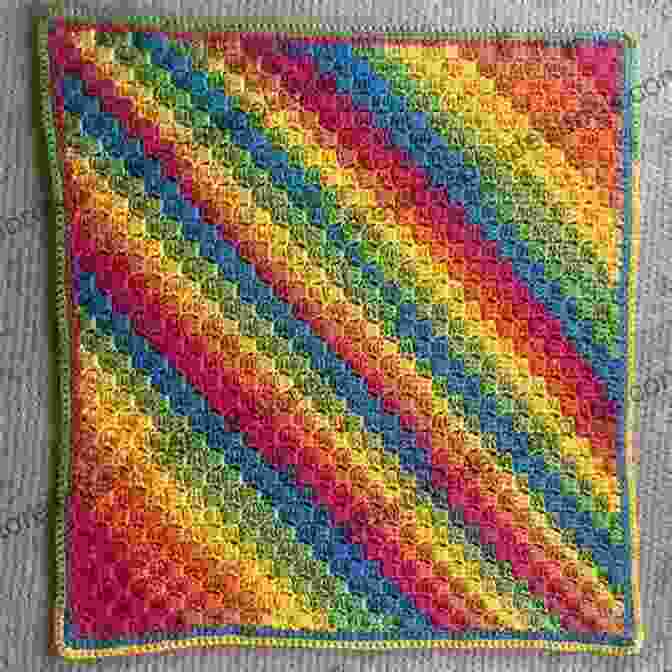 A Vibrant C2C Blanket Featuring Intricate Patterns And Bright Colors C2C CROCHET GUIDE FOR BEGINNERS : EASY C2C CROCHET PROJECT GUIDE