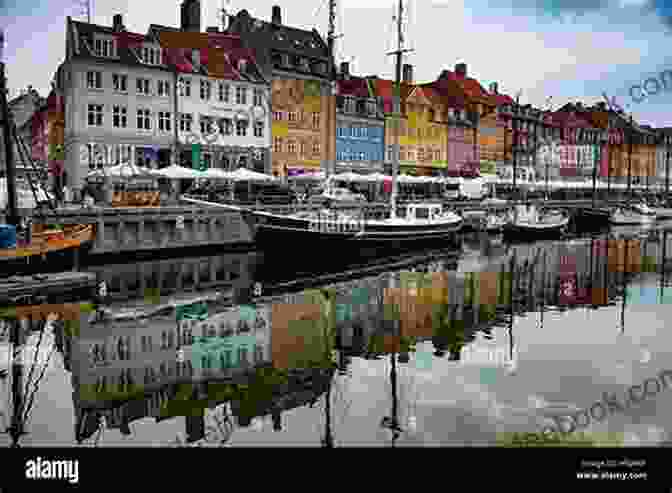 A Vibrant Photograph Of The Colorful Nyhavn Canal, Lined With Historic Buildings And Boats. Copenhagen: Travel Photography Andrey Taranov