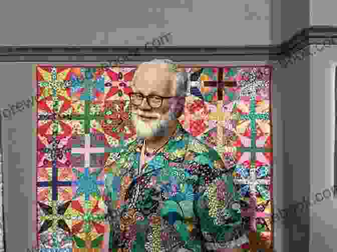 Scott Flanagan, The Renowned Quilter And Artist, Holding One Of His Captivating Jelly Roll Quilts, A Symbol Of His Artistic Legacy. Charming Jelly Roll Quilts Scott Flanagan